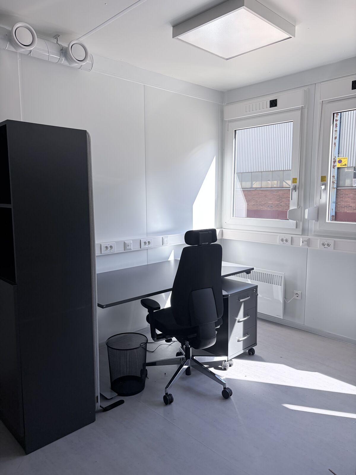 Office interior of a delivered modular unit